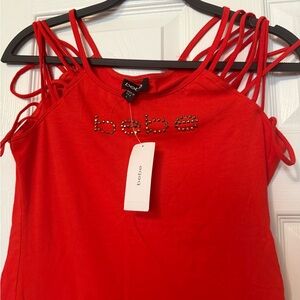 Women top by Bebe